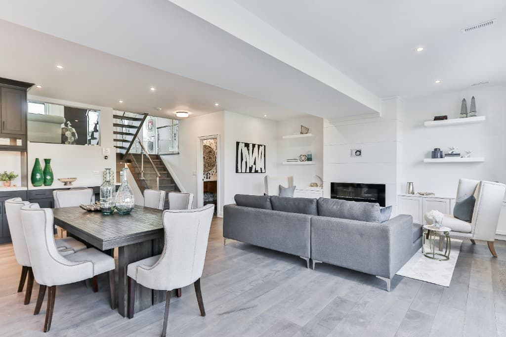 Modern living and dining room with a fireplace